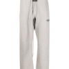 fear-of-god-essentials-logo-patch-drawstring-track-pants